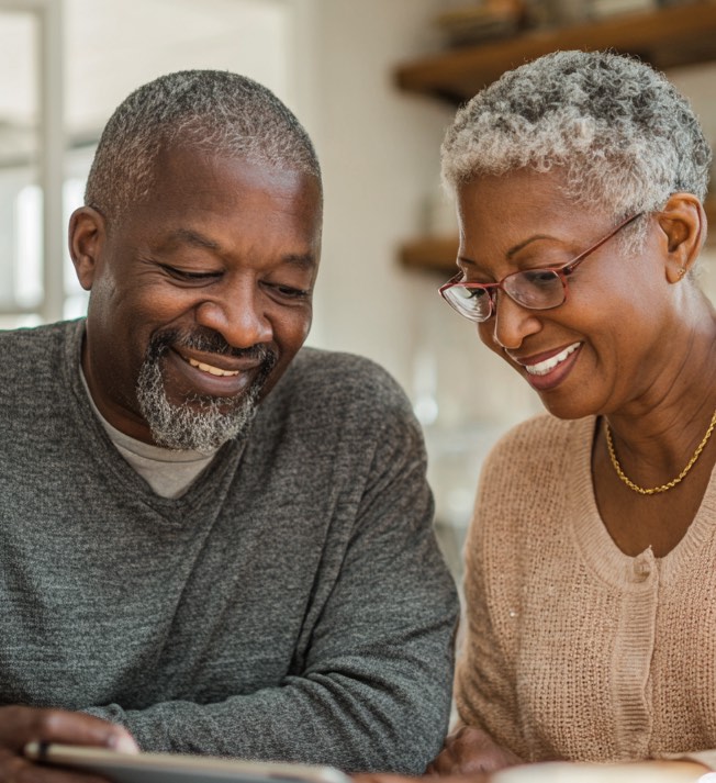 Senior couple reviewing Medicare cost and coverage options during an annual insurance review in Southwest Virginia, Tennessee, and North Carolina