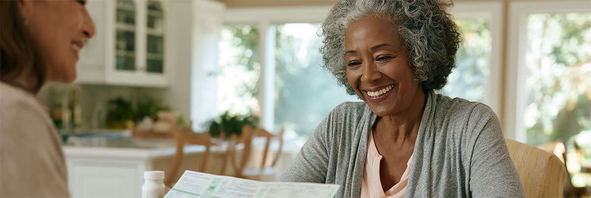 Older adult reviewing prescription drug coverage options with a trusted Medicare advisor before enrolling in Medicare Part D.